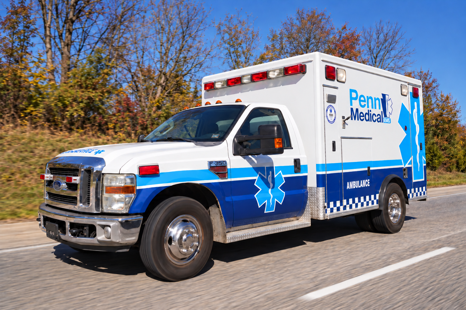 A crew member pushing a patient on a stretcher